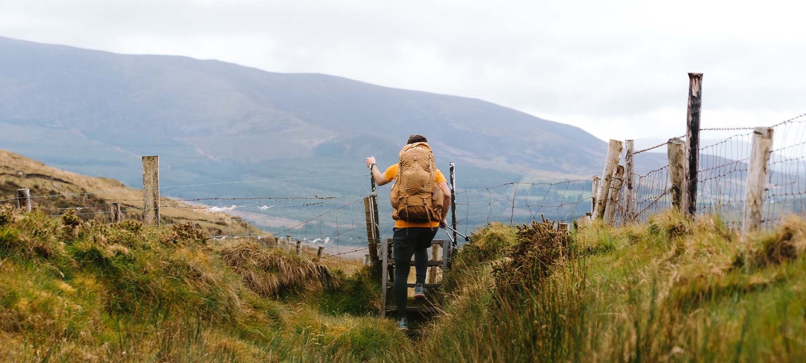 Person med rygsæk på tur.